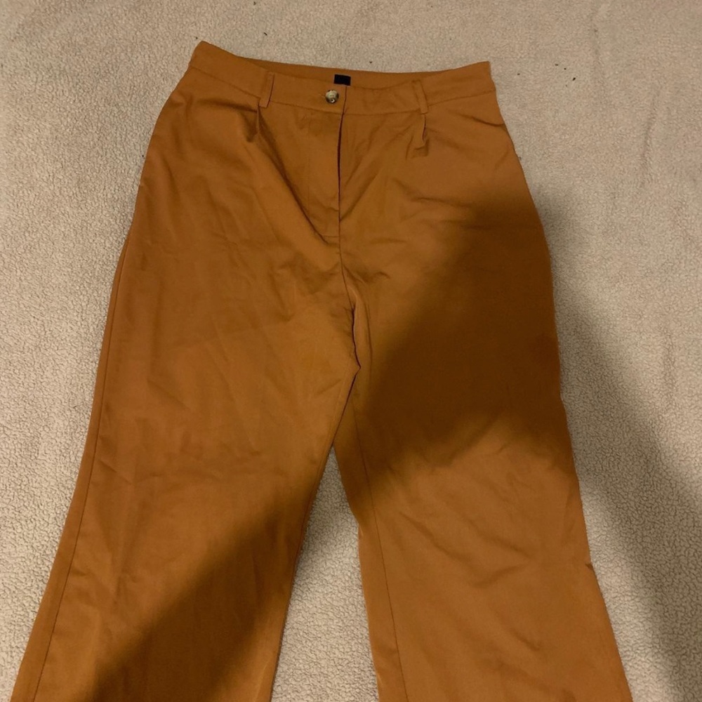 burnt orange flowy flared pants